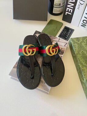 Gucci Women's Black Slides with Red Detail